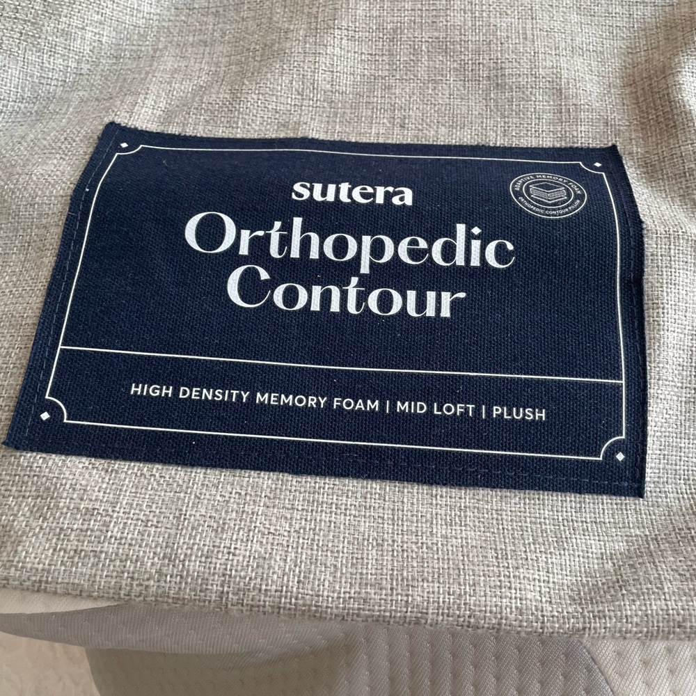 Sutera Orthopedic Contour pillow. Cradles your neck for a good sleep.